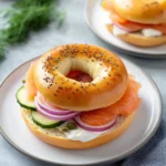 Classic Salmon Bagel Sandwich with Cream Cheese and Capers First Image First Image