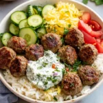 Gyro Bowls (Meatballs with Tzatziki, Lemon Rice, and Cucumber Salad) First Image First Image